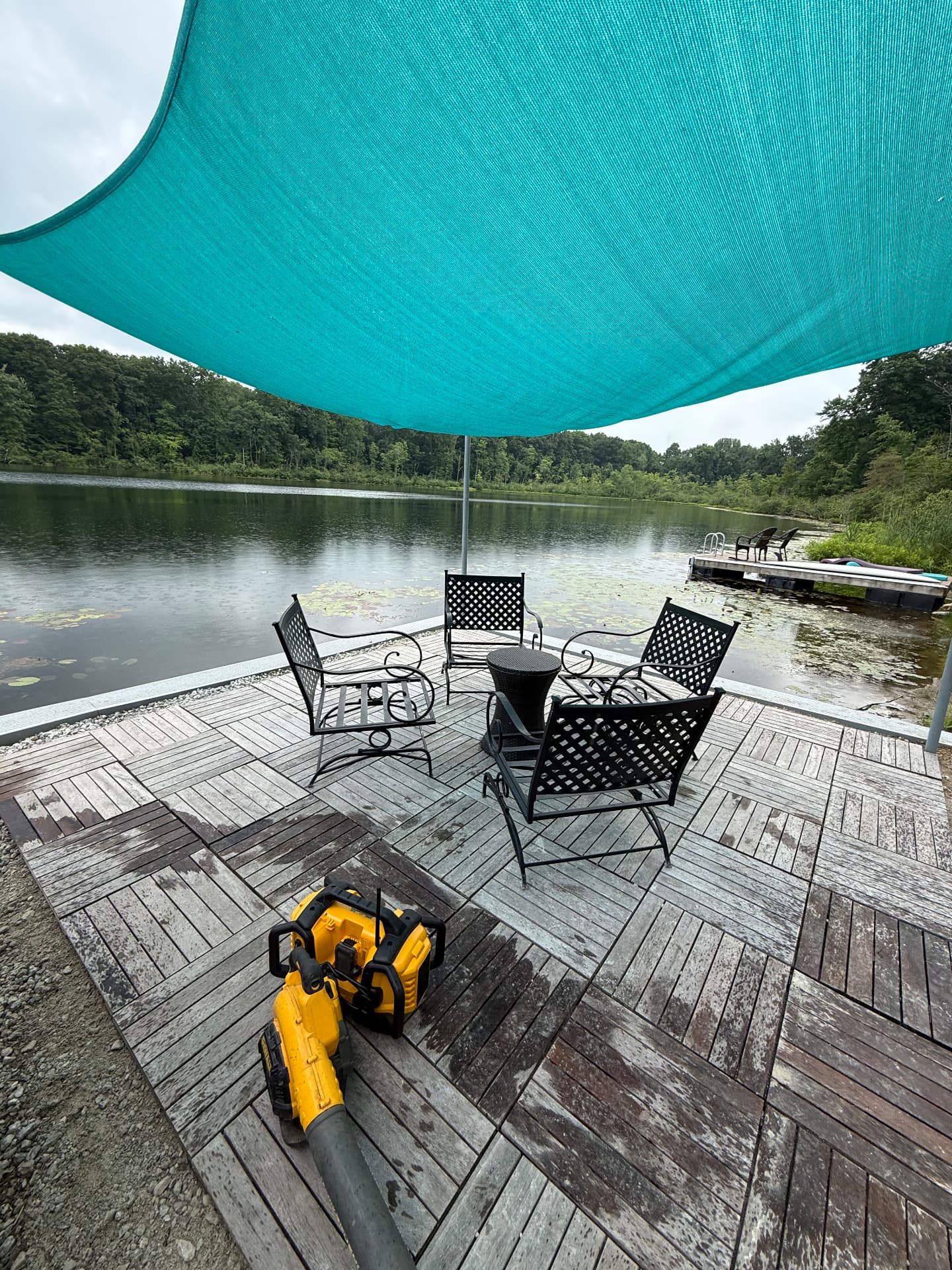 Detailed view of a lakeside platform with modular deck tiles
